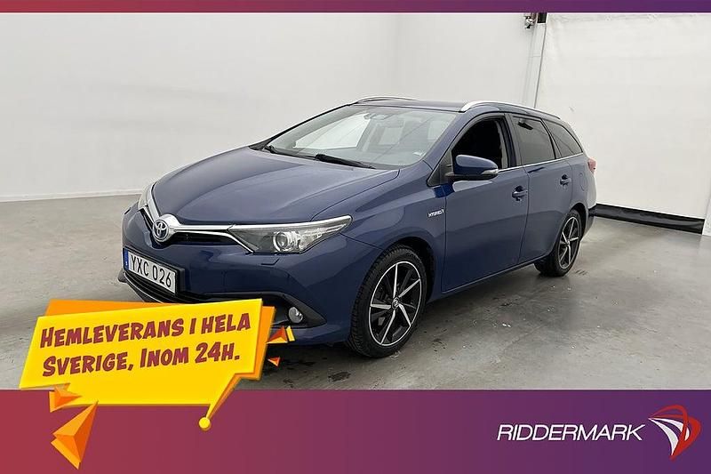 Mörkblå Begagnad 2017 Toyota Auris Hybrid Edition Kombi | 169 800 kr (Marknadspris) - Bild 1/3
