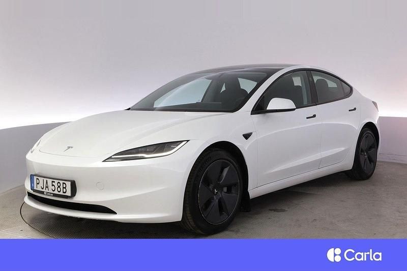 Vit Begagnad 2024 Tesla Model 3 Long Range AWD Sedan | 474 900 kr - Bild 1/4