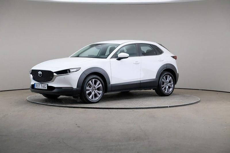 Vit (arctic white (solid)) Begagnad 2023 Mazda CX-30 Exclusive-Line SUV | 239 000 kr (Marknadspris) - Bild 1/4