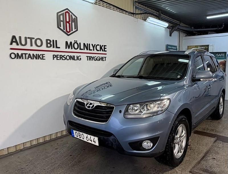 Ljusblå Begagnad 2009 Hyundai Santa Fe SUV | 64 900 kr (Lite dyr) - Bild 1/4