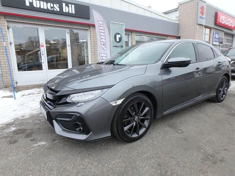 Mörkgrå Begagnad 2021 Honda Civic Elegance Halvkombi | 214 500 kr (Marknadspris) - Bild 1/4
