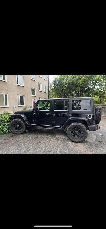 Svart Begagnad 2015 Jeep Wrangler Unlimited SUV | 269 000 kr (Bra pris) - Bild 1/2