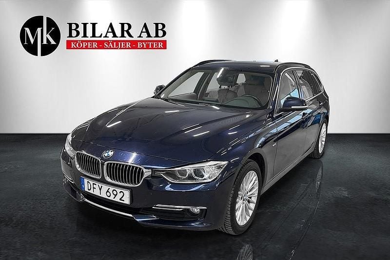 Blå Begagnad 2014 BMW 320 Kombi | 164 900 kr (Marknadspris) - Bild 1/4