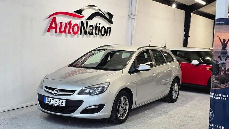 Grå Begagnad 2016 Opel Astra Enjoy Kombi | 59 900 kr (Marknadspris) - Bild 1/4