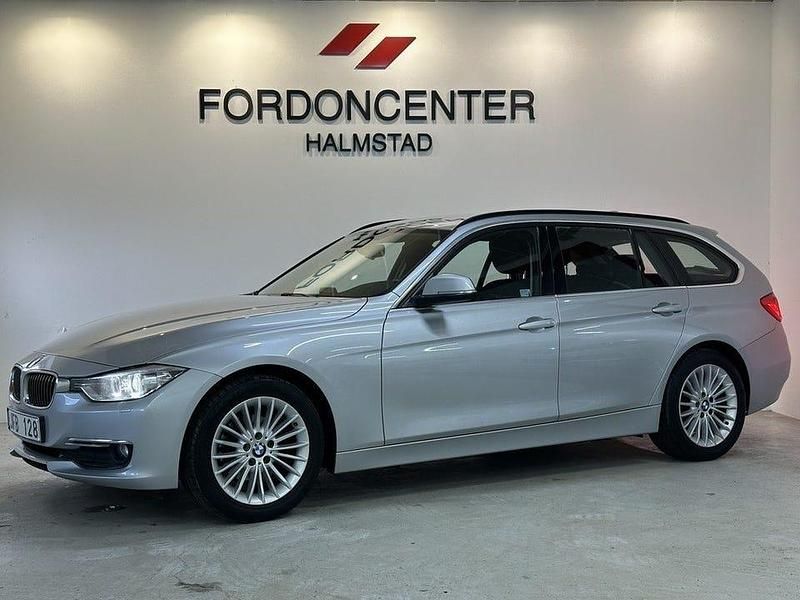 Silver Begagnad 2012 BMW 318 Luxury Line Kombi | 139 000 kr (Lite dyr) - Bild 1/4