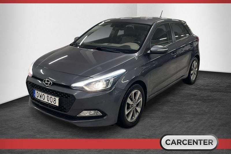 Mörkgrå Begagnad 2014 Hyundai i20 Premium Halvkombi | 69 500 kr (Marknadspris) - Bild 1/4