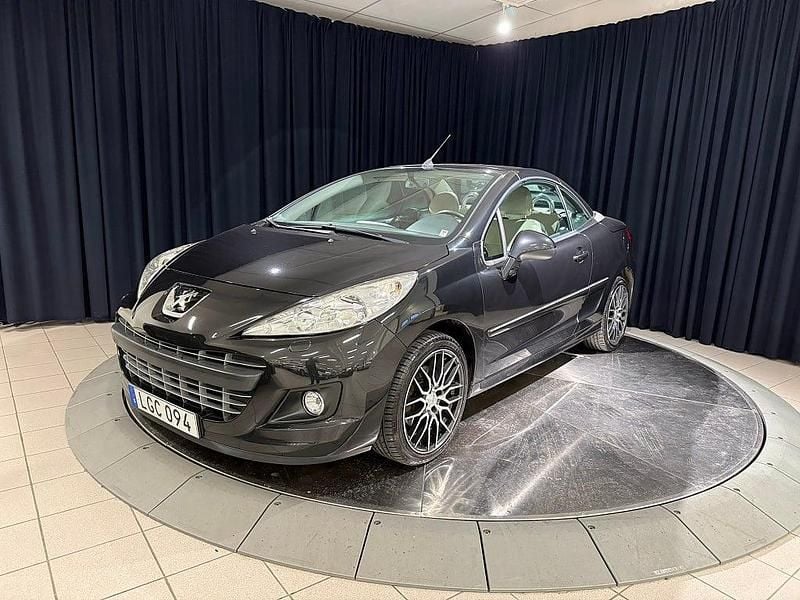 Svart metallic Begagnad 2011 Peugeot 207 CC Cab | 64 900 kr (Marknadspris) - Bild 1/4