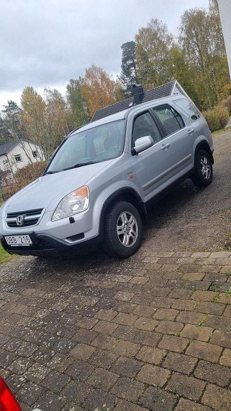 Silver Begagnad 2003 Honda CR-V SUV | 44 000 kr (Marknadspris) - Bild 1/4