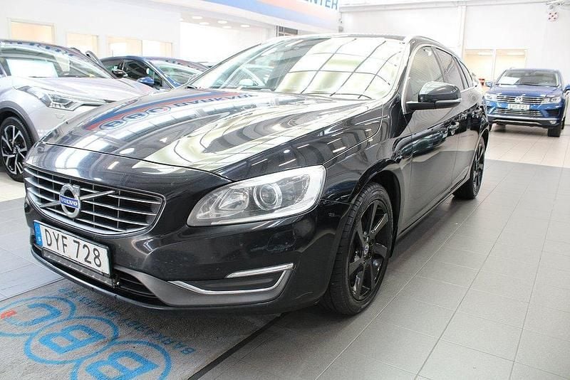 Svart Begagnad 2014 Volvo V60 Summum Kombi | 159 900 kr (Marknadspris) - Bild 1/4