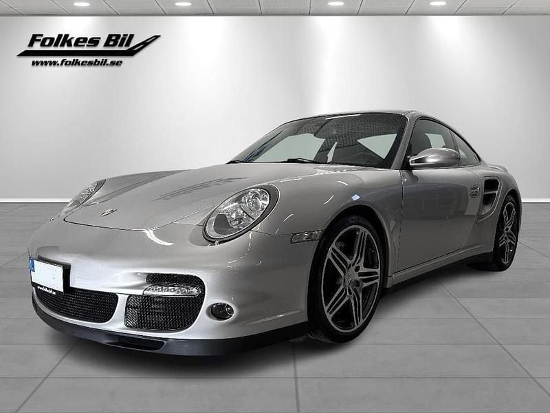 Grå Begagnad 2006 Porsche 911 Turbo Sport Sportkupé | 1 299 000 kr - Bild 1/4