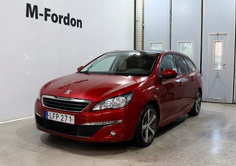 Mörkröd (röd) Begagnad 2016 Peugeot 308 Style Kombi | 114 900 kr (Marknadspris) - Bild 1/4