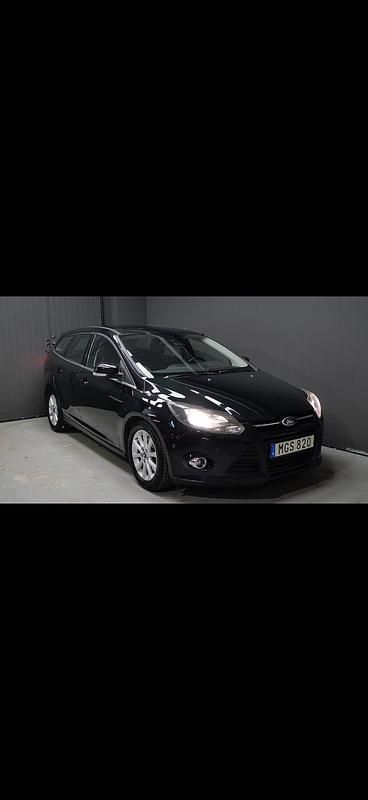 Begagnad Ford Focus Titanium 116 HK (85 kW) 2011 Svart Kombi