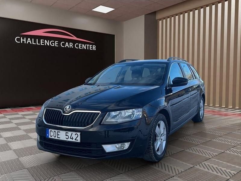Svart Begagnad 2013 Skoda Octavia Ambition Kombi | 77 900 kr (Marknadspris) - Bild 1/4