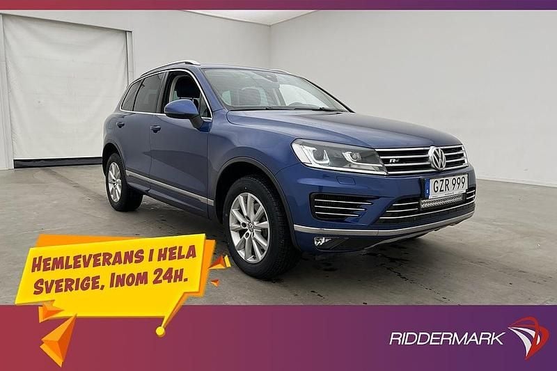 Blå Begagnad 2015 VW Touareg R-line SUV | 229 800 kr (Marknadspris) - Bild 1/3