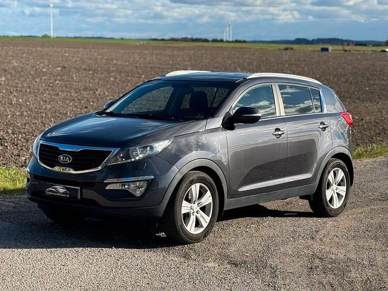 Grå Begagnad 2013 Kia Sportage SUV | 74 900 kr (Marknadspris) - Bild 1/4
