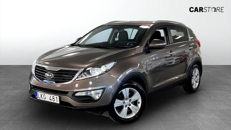 Ljusbrun (brown) Begagnad 2012 Kia Sportage Comfort SUV | 90 000 kr (Bra pris) - Bild 1/4