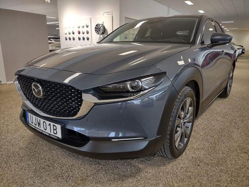 Grå Begagnad 2023 Mazda CX-30 Cosmo SUV | 289 900 kr (Marknadspris) - Bild 1/4