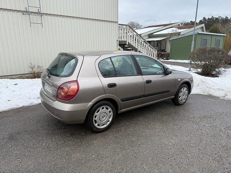 Begagnad Nissan Almera 98 HK (72 kW) 2006 Brun