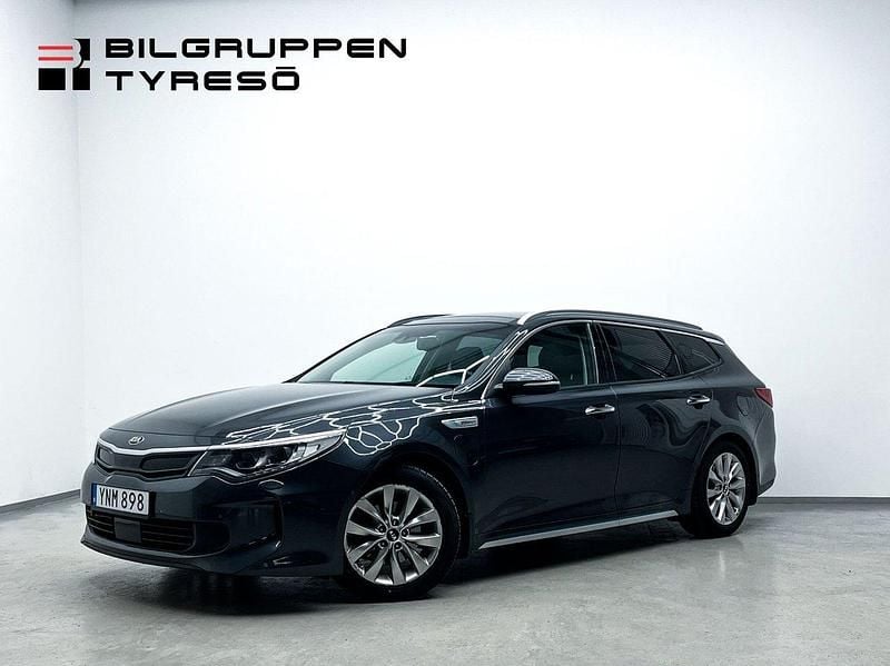 Grå Begagnad 2018 Kia Optima Hybrid 2 Sedan | 169 900 kr (Marknadspris) - Bild 1/4