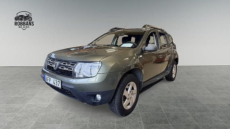 Grå Begagnad 2013 Dacia Duster SUV | 76 899 kr (Marknadspris) - Bild 1/4