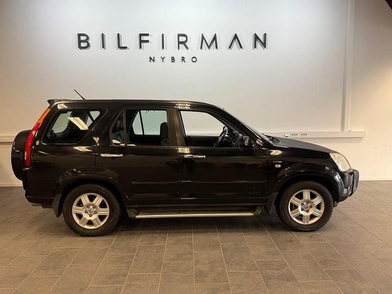 Svart Begagnad 2004 Honda CR-V SUV | 69 900 kr (Dyr) - Bild 1/4