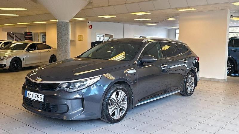 Grå Begagnad 2017 Kia Optima Hybrid Comfort Sedan | 179 900 kr (Marknadspris) - Bild 1/4