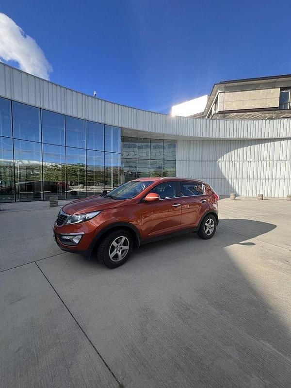 Röd Begagnad 2013 Kia Sportage Comfort SUV | 90 000 kr (Marknadspris) - Bild 1/4