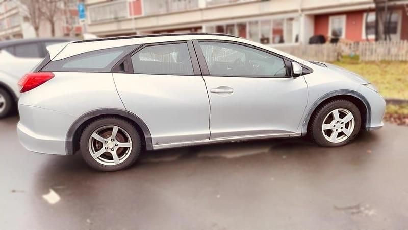 Begagnad 2014 Honda Civic Kombi | 16 000 kr - Bild 1/4