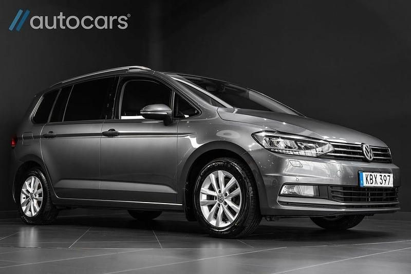 Mörkgrå Begagnad 2015 VW Touran Minibuss | 168 000 kr (Dyr) - Bild 1/4