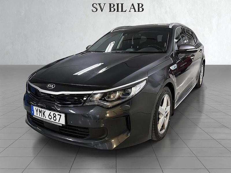 Grå Begagnad 2017 Kia Optima Hybrid Comfort Sedan | 174 900 kr (Marknadspris) - Bild 1/4