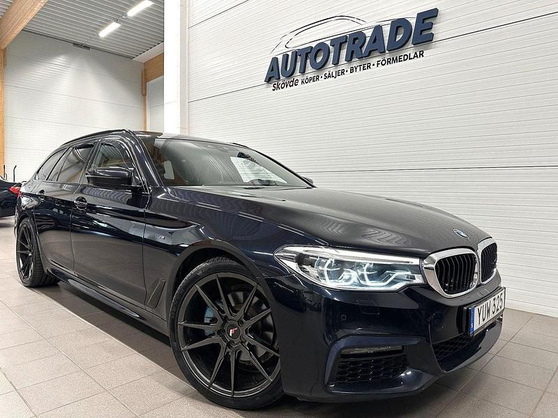 Svart Begagnad 2019 BMW 520 M Sport Kombi | 288 900 kr (Lite dyr) - Bild 1/4