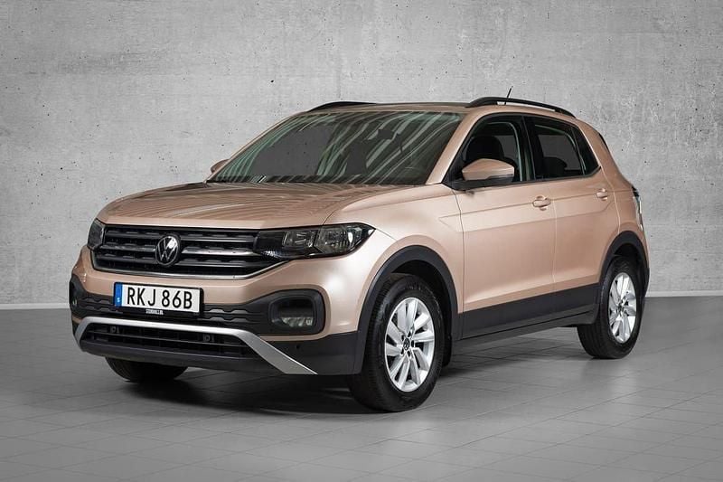 Mörkblå (blå) Begagnad 2021 VW T-Cross SUV | 159 000 kr (Marknadspris) - Bild 1/4