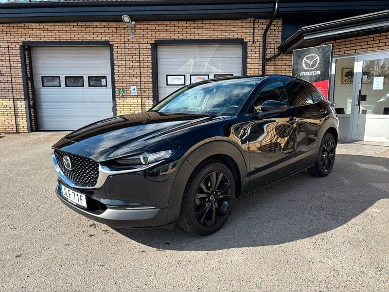 Svart Begagnad 2021 Mazda CX-30 Homura-Line SUV | 239 500 kr (Marknadspris) - Bild 1/4