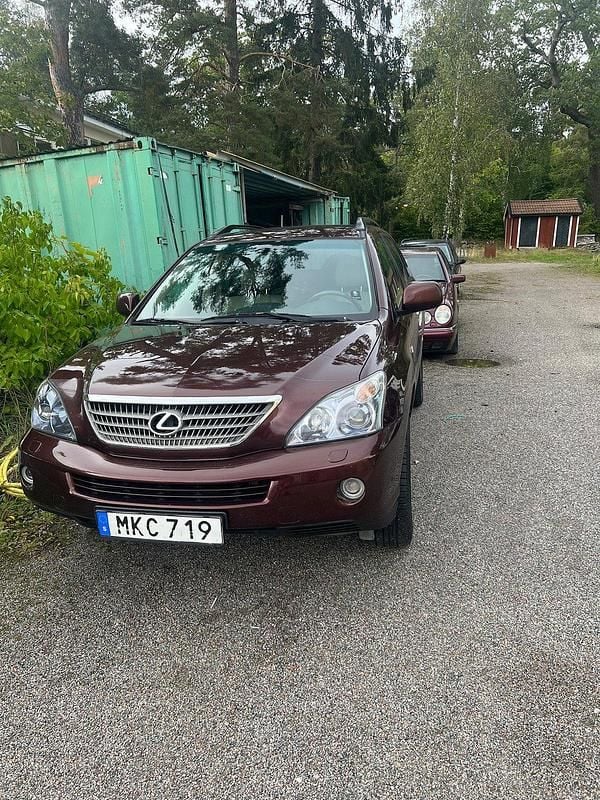Mörkbrun Begagnad 2007 Lexus RX400h SUV | 79 500 kr (Marknadspris) - Bild 1/4