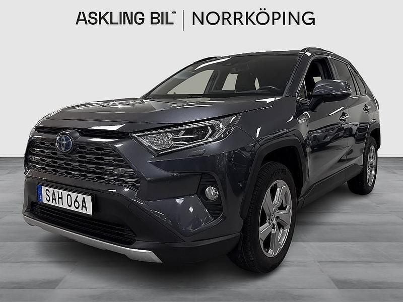 Mörkgrå Begagnad 2021 Toyota RAV4 Hybrid Executive SUV | 354 000 kr (Marknadspris) - Bild 1/4
