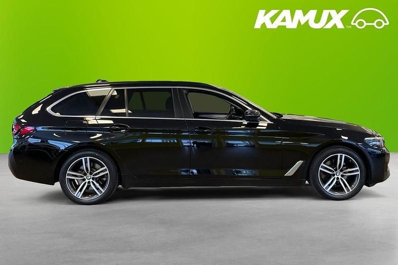Begagnad BMW 520 191 HK (140 kW) 2023 Svart Kombi