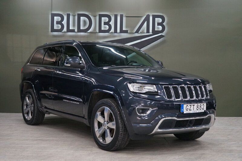 Blå Begagnad 2015 Jeep Grand Cherokee SUV | 219 900 kr (Marknadspris) - Bild 1/4