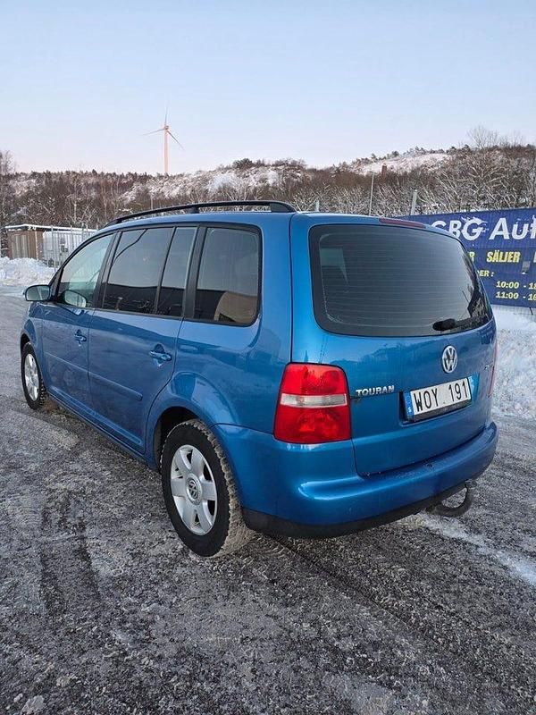 Begagnad VW Touran 150 HK (110 kW) 2005 Blå Minibuss