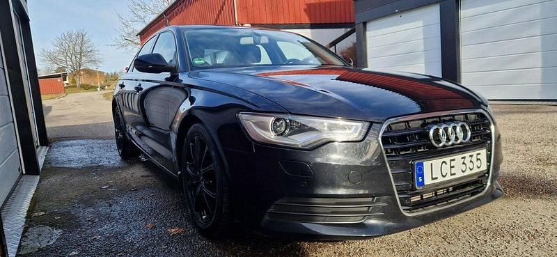 Svart Begagnad 2014 Audi A6 Sedan | 148 900 kr (Marknadspris) - Bild 1/4
