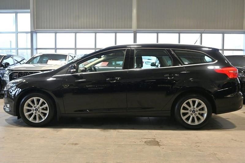 Begagnad Ford Focus Titanium 125 HK (91 kW) 2016 Svart Kombi