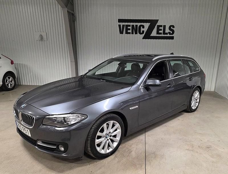 Grå metallic Begagnad 2015 BMW 520 Kombi | 129 000 kr (Marknadspris) - Bild 1/4