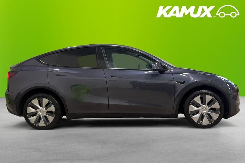 Begagnad Tesla Model Y Long Range AWD 378 kW (514 HK) 2022 Silver/grå SUV