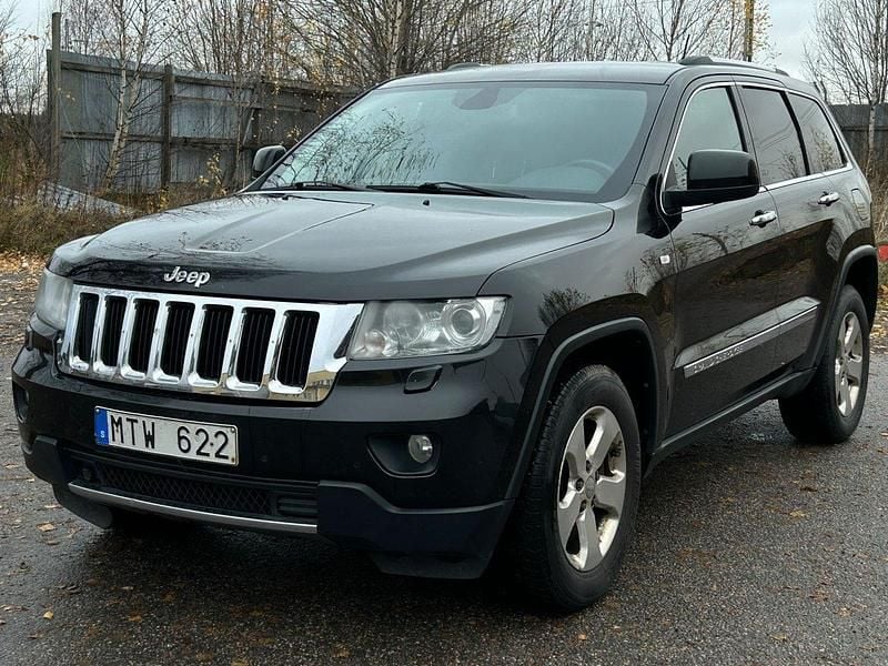 Svart Begagnad 2012 Jeep Grand Cherokee SUV | 109 999 kr (Dyr) - Bild 1/4