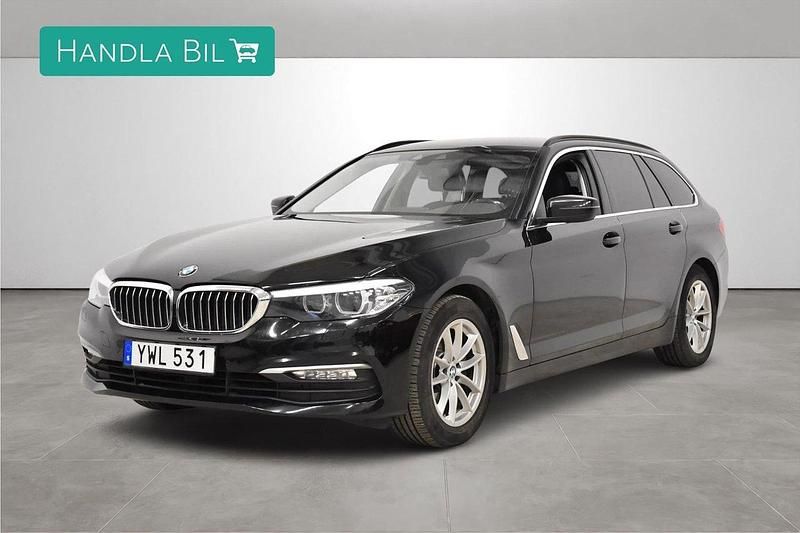Svart Begagnad 2017 BMW 520 Kombi | 229 900 kr (Marknadspris) - Bild 1/4