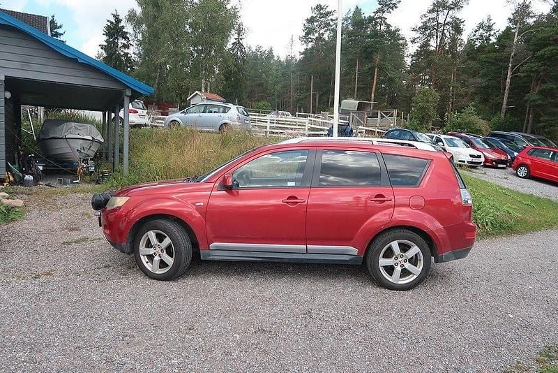 Mörkröd Begagnad 2008 Mitsubishi Outlander SUV | 49 500 kr (Marknadspris) - Bild 1/4