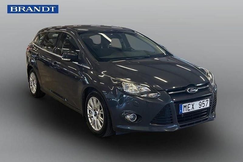 Grå Begagnad 2012 Ford Focus Titanium Kombi | 49 900 kr (Marknadspris) - Bild 1/4