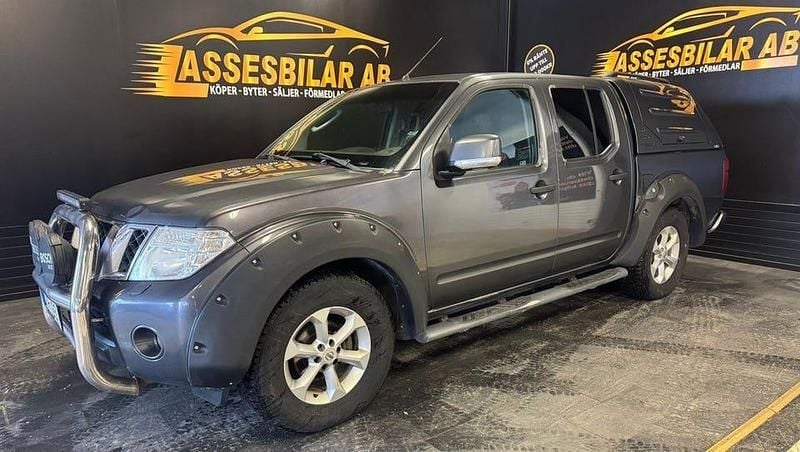 Grå Begagnad 2012 Nissan Navara Pickup | 89 900 kr (Marknadspris) - Bild 1/1