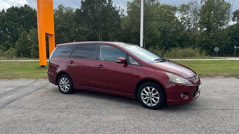 Mörkröd Begagnad 2004 Mitsubishi Grandis Minibuss | 24 800 kr (Marknadspris) - Bild 1/4