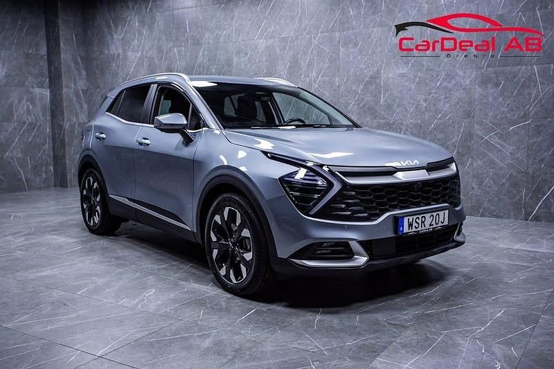 Grå Begagnad 2023 Kia Sportage Advance SUV | 359 800 kr (Marknadspris) - Bild 1/4