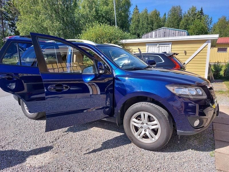 Blå Begagnad 2011 Hyundai Santa Fe SUV | 82 000 kr (Marknadspris) - Bild 1/4